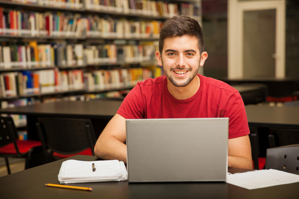 Students learning web development on laptops